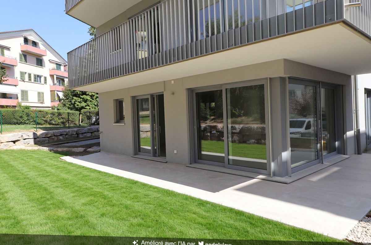Vue_baies_sejour Rare à saisir! Magnifique appartement neuf en rez-jardin, 3 chambres, très proche du centre, quartier sans aucune nuisance!